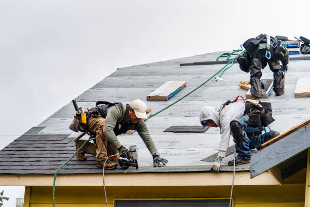 Professional Gutter Installation technician working in East Elmhurst, NY